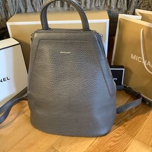 Matt and nat grey neutral leather backpack